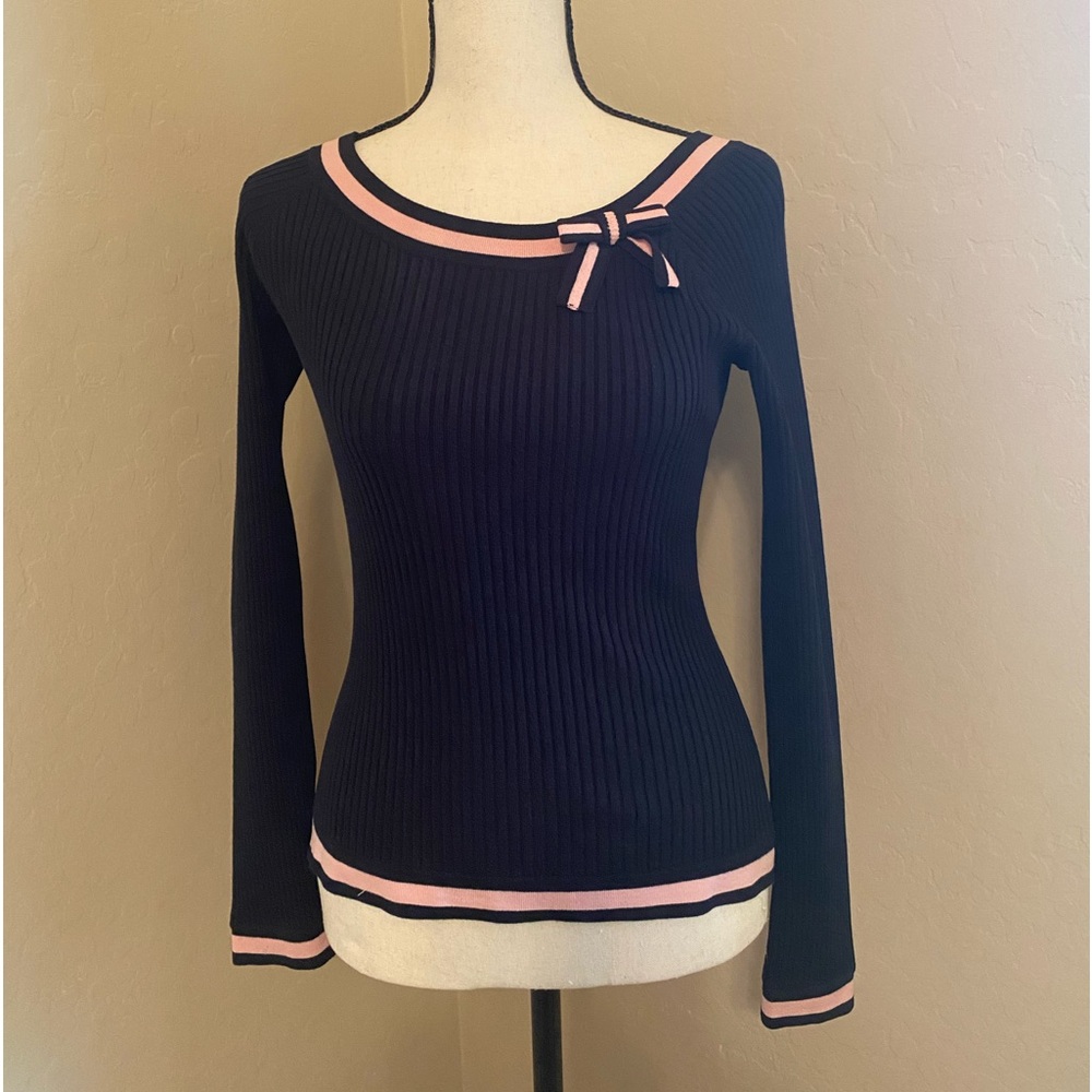 Long sleeve navy sweater with pink trim, and bow appliqué